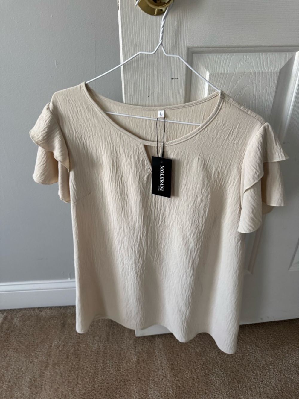 Noble Fair Cream Ruffle Sleeve Blouse - Women's